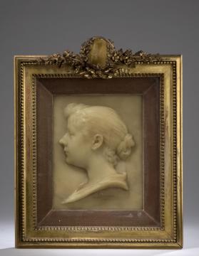Alfred Boucher (1850-1934)  Profil de jeune fille Bas-relief en cire Signé et daté 
